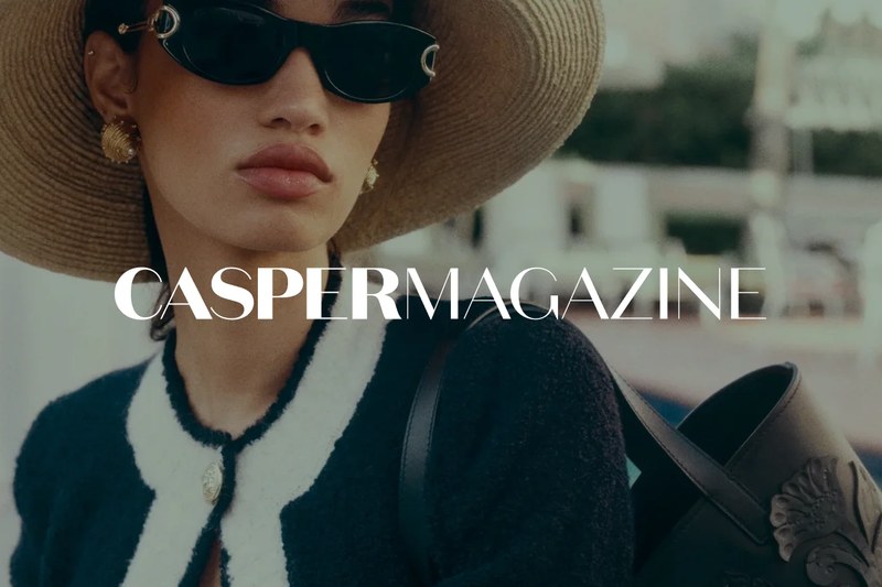 The Casper Magazine wordmark over a portrait of a woman in a straw hat and sunglasses