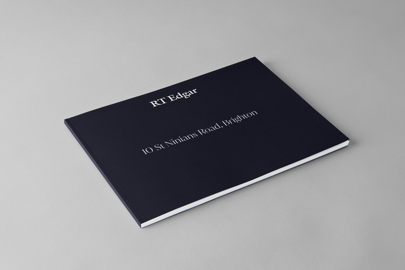 RT Edgar property brochure with a navy cover