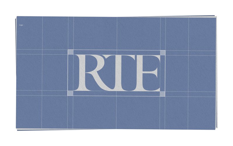 Construction grid for the RTE monogram on blue